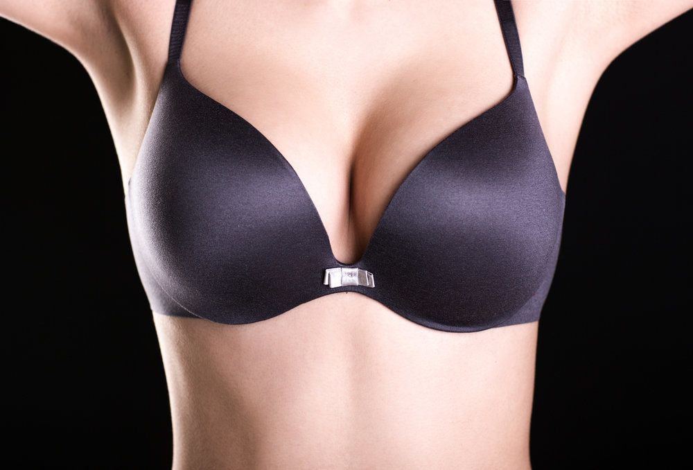 Fairfield County breast augmentation cost model wearing black