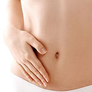 liposuction patient model showing bare stomach
