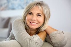 A woman at home in her living room