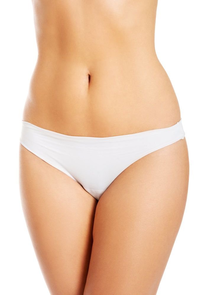 A woman's slim, contoured abdomen and thighs